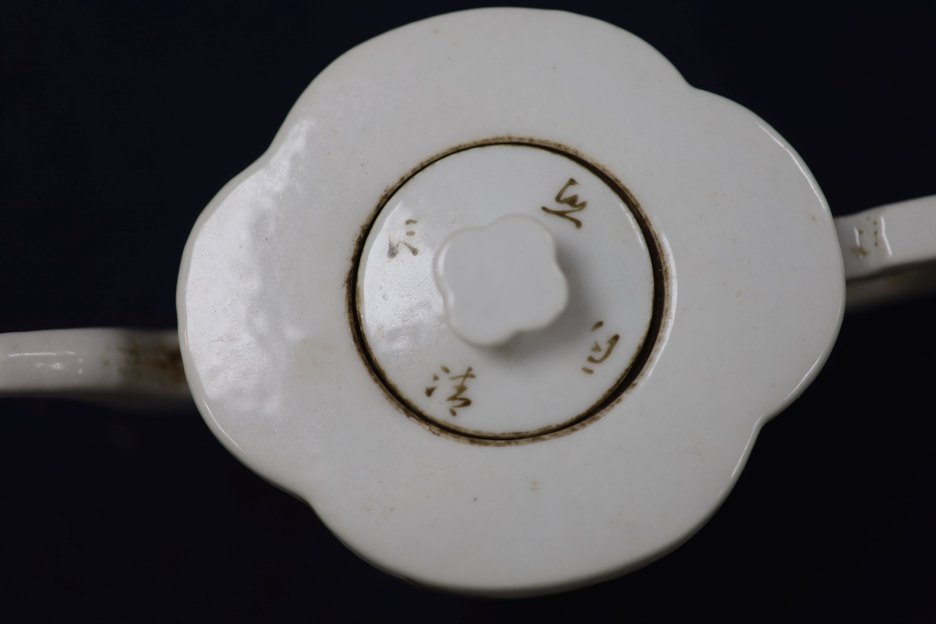 A Chinese famille rose quatre lobed teapot and cover, length 19cm